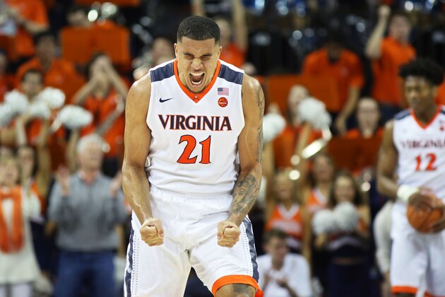 CHARLOTTESVILLE, VA - MARCH 3: Isaiah Wilkins #21 of the Virginia Cavaliers cheers in the second half during a game against the Notre Dame Fighting Irish at John Paul Jones Arena on March 3, 2018 in Charlottesville, Virginia. Virginia defeated Notre Dame 62-57. (Photo by Ryan M. Kelly/Getty Images)