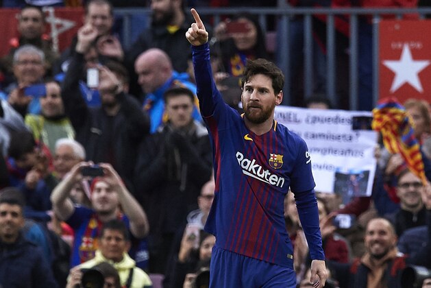 BARCELONA, SPAIN - MARCH 04:  Lionel Messi of Barcelona celebrates after scoring his sides first goal during the La Liga match between FC Barcelona and Atletico de Madrid at Camp Nou on March 4, 2018 in Barcelona, Spain.  (Photo by Quality Sport Images/Getty Images)