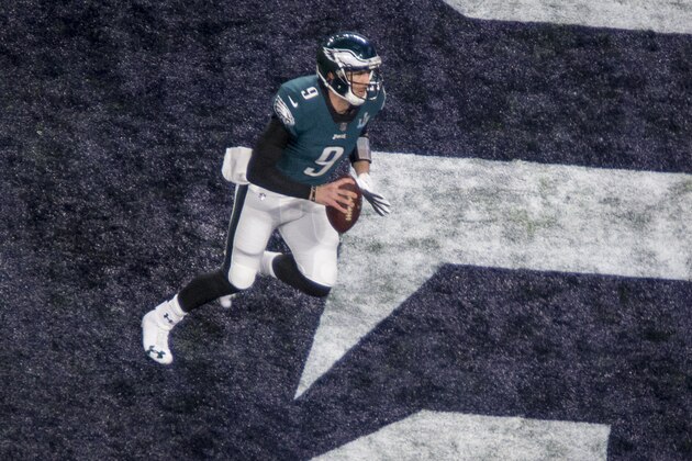 Philadelphia Eagles quarterback Nick Foles makes a catch for a touchdown against the New England Patriots in the second quarter of the NFL Super Bowl 52 football game Sunday, Feb. 4, 2018, in Minneapolis. (AP Photo/Bruce Kluckhohn)