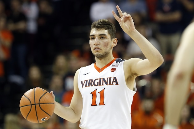 Virginia guard Ty Jerome (11) calls a play during the second half of an NCAA college basketball game in Charlottesville, Va., Saturday, March 3, 2018. Virginia won the game 62-57. (AP Photo/Steve Helber)
