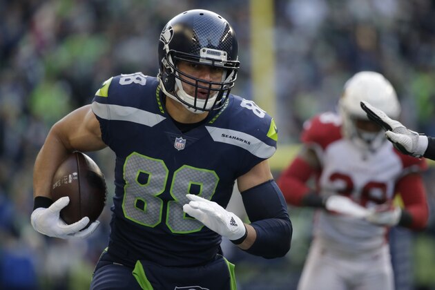 Seattle Seahawks tight end Jimmy Graham (88) runs the ball after a reception against the Arizona Cardinals in the second half of an NFL football game, Sunday, Dec. 31, 2017, in Seattle. (AP Photo/John Froschauer)