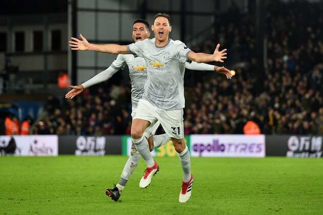 Manchester United's Serbian midfielder Nemanja Matic (R) celebrates scoring his team's third goal during the English Premier League football match between Crystal Palace and Manchester United at Selhurst Park in south London on March 5, 2018. / AFP PHOTO / Glyn KIRK / RESTRICTED TO EDITORIAL USE. No use with unauthorized audio, video, data, fixture lists, club/league logos or 'live' services. Online in-match use limited to 75 images, no video emulation. No use in betting, games or single club/league/player publications.  /         (Photo credit should read GLYN KIRK/AFP/Getty Images)