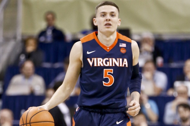 Virginia's Kyle Guy (5) plays against Pittsburgh during an NCAA college basketball game, Saturday, Feb. 24, 2018, in Pittsburgh. (AP Photo/Keith Srakocic)
