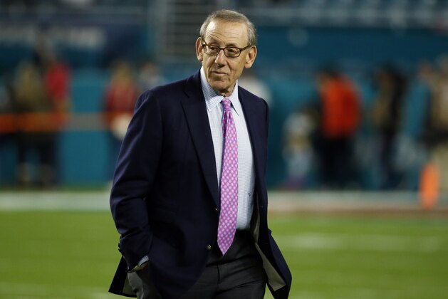 Miami Dolphins owner Stephen M. Ross watches his team before an NFL football game against the New England Patriots, Monday, Dec. 11, 2017, in Miami Gardens, Fla. (AP Photo/Wilfredo Lee)