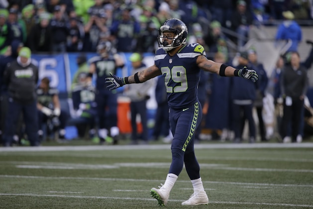 Seattle Seahawks free safety Earl Thomas walks on the field during the first half of an NFL football game against the Arizona Cardinals, Sunday, Dec. 31, 2017, in Seattle. (AP Photo/John Froschauer)
