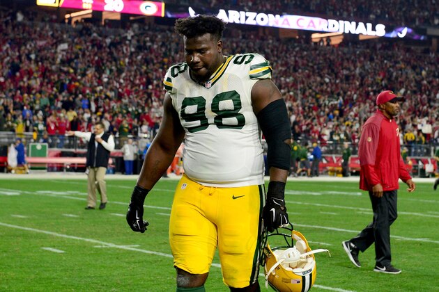 GLENDALE, AZ - JANUARY 16:  Defensive end Letroy Guion #98 of the Green Bay Packers walks off the field after losing in overtime to the Arizona Cardinals 26-20  in the NFC Divisional Playoff Game at University of Phoenix Stadium on January 16, 2016 in Glendale, Arizona.  (Photo by Jennifer Stewart/Getty Images)