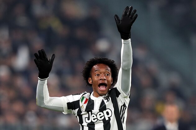 TURIN, ITALY - DECEMBER 23: Juan Cuadrado of Juventus in action during the serie A match between Juventus and AS Roma on December 23, 2017 in Turin, Italy.  (Photo by Gabriele Maltinti/Getty Images)