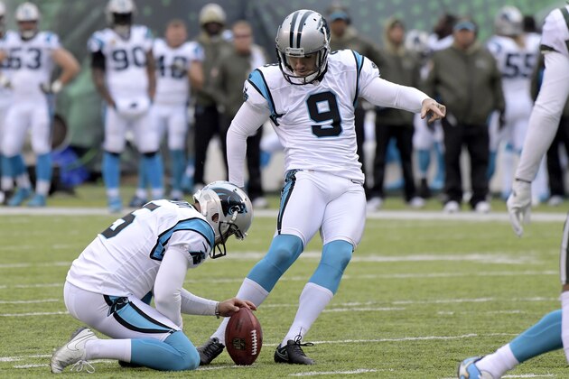 Carolina Panthers kicker Graham Gano (9), with Michael Palardy holding, kicks a field goal against the New York Jets during the first half of an NFL football game, Sunday, Nov. 26, 2017, in East Rutherford, N.J. (AP Photo/Bill Kostroun)