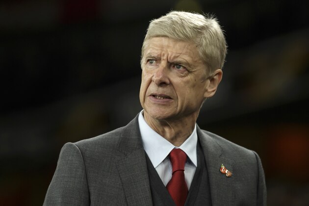 FILe - In this file photo dated Thursday, Nov. 2, 2017, Arsenal's manager Arsene Wenger arrives for the Group H Europa League soccer match between Arsenal and Red Star Belgrade at the Emirates stadium in London, Britain. The English Football Association on Friday Jan. 5, 2018, has banned Arsene Wenger from the touchline for three games after the Arsenal manager accepted he was abusive when questioning the integrity of a referee, after the 1:1 game against West Bromwich Albion on Sunday. (AP Photo/Tim Ireland, FILE)