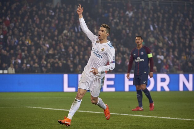 PARIS, FRANCE - MARCH 06:  Cristiano Ronaldo of Real Madrid celebrates his team second goal during the UEFA Champions League Round of 16 Second Leg match between Paris Saint-Germain and Real Madrid at Parc des Princes on March 6, 2018 in Paris, France.  (Photo by Manuel Queimadelos Alonso/Getty Images)