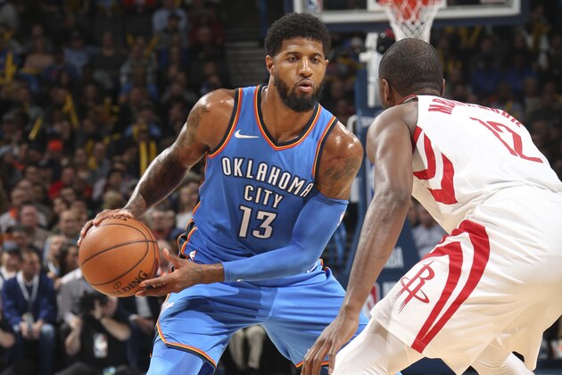 OKLAHOMA CITY, OK -  MARCH 6: Paul George #13 of the Oklahoma City Thunder handles the ball against the Houston Rockets on March 6, 2018 at Chesapeake Energy Arena in Oklahoma City, Oklahoma. NOTE TO USER: User expressly acknowledges and agrees that, by downloading and or using this photograph, User is consenting to the terms and conditions of the Getty Images License Agreement. Mandatory Copyright Notice: Copyright 2018 NBAE (Photo by Layne Murdoch Sr./NBAE via Getty Images)
