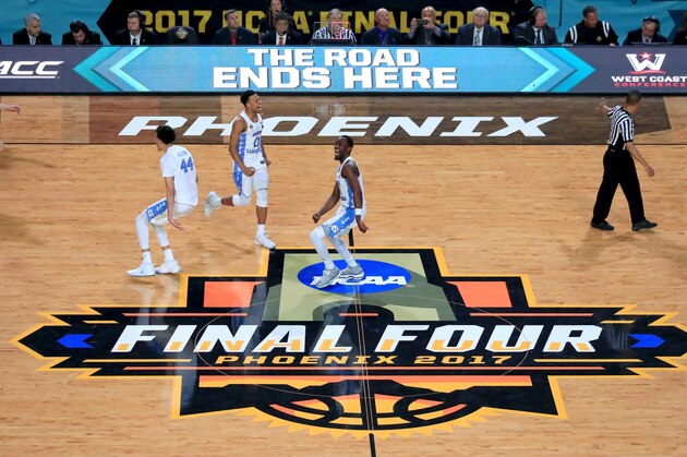 GLENDALE, AZ - APRIL 03: Justin Jackson #44, Nate Britt #0 and Theo Pinson #1 of the North Carolina Tar Heels celebrate after defeating the Gonzaga Bulldogs during the 2017 NCAA Men's Final Four National Championship game at University of Phoenix Stadium on April 3, 2017 in Glendale, Arizona. The Tar Heels defeated the Bulldogs 71-65. (Photo by Christian Petersen/Getty Images)