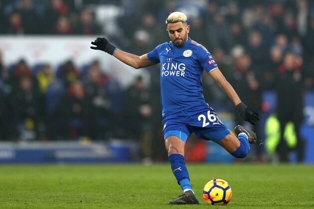 LEICESTER, ENGLAND - MARCH 03:  Riyad Mahrez of Leicester City scores his sides first goal during the Premier League match between Leicester City and AFC Bournemouth at The King Power Stadium on March 3, 2018 in Leicester, England.  (Photo by Catherine Ivill/Getty Images)