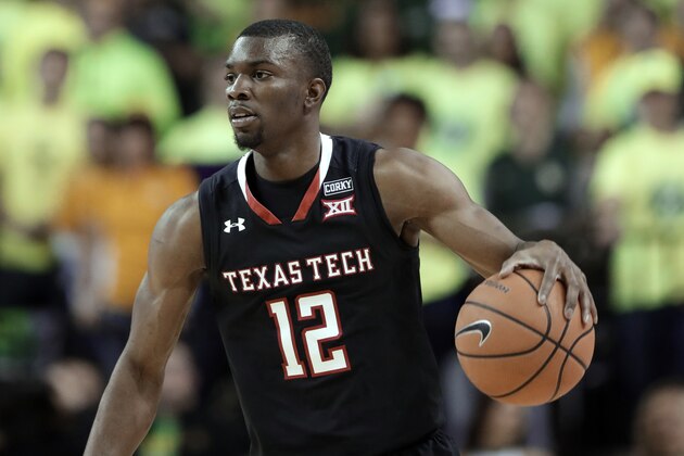 Texas Tech guard Keenan Evans (12) handles the ball during an NCAA college basketball game against Baylor on Saturday, Feb. 17, 2018, in Waco, Texas. (AP Photo/Tony Gutierrez)