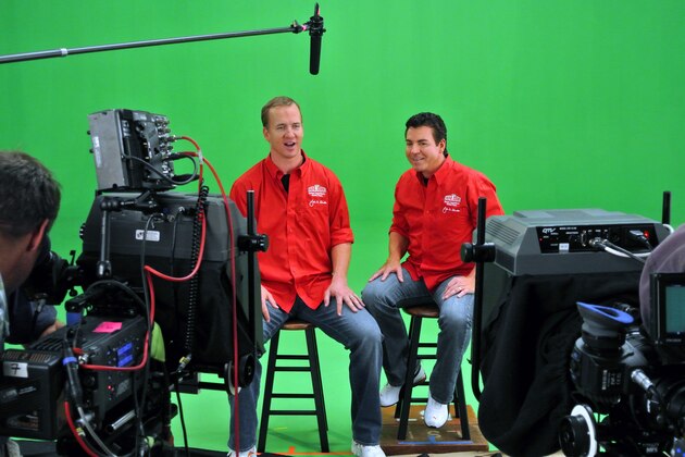 IMAGE DISTRIBUTED FOR PAPA JOHN'S - In this photo released by Papa John's on Friday, Oct. 26, 2012,  Denver Broncos quarterback Peyton Manning, left, shoots a television spot with Papa John's Founder, Chairman and CEO John Schnatter, during which Manning reveals that he is Papa John's latest franchisee. Papa John's newest