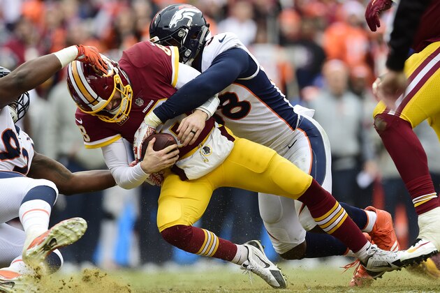 LANDOVER, MD - DECEMBER 24: Quarterback Kirk Cousins #8 of the Washington Redskins is sacked by outside linebacker Von Miller #58 of the Denver Broncos in the second quarter at FedExField on December 24, 2017 in Landover, Maryland. (Photo by Patrick McDermott/Getty Images) LANDOVER, MD - DECEMBER 24: Quarterback Kirk Cousins #8 of the Washington Redskins is sacked by outside linebacker Von Miller #58 of the Denver Broncos in the second quarter at FedExField on December 24, 2017 in Landover, Maryland. (Photo by Patrick McDermott/Getty Images)