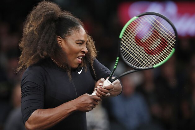 Serena Williams of the United States grimaces as she follows through on a shot during the Tie Break Tens tournament at Madison Square Garden, Monday, March 5, 2018 in New York. The Tie Break Tens' New York event is a one-day day exhibition tournament featuring eight female players competing for a $250,000 winner's prize. (AP Photo/Kathy Willens)