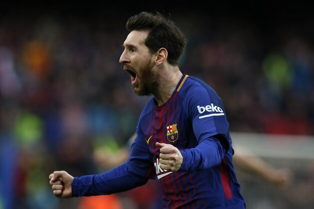 FC Barcelona's Lionel Messi reacts after scoring during the Spanish La Liga soccer match between FC Barcelona and Atletico Madrid at the Camp Nou stadium in Barcelona, Spain, Sunday, March 4, 2018. (AP Photo/Manu Fernandez)