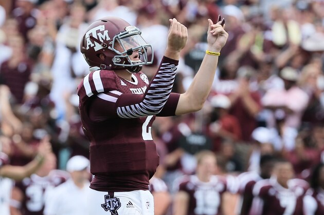 COLLEGE STATION, TX - AUGUST 31:  Johnny Manziel #2 of the Texas A&M Aggies celebrates a third quarter touchdown during the game against the Rice Owls at Kyle Field on August 31, 2013 in College Station, Texas.  (Photo by Scott Halleran/Getty Images)