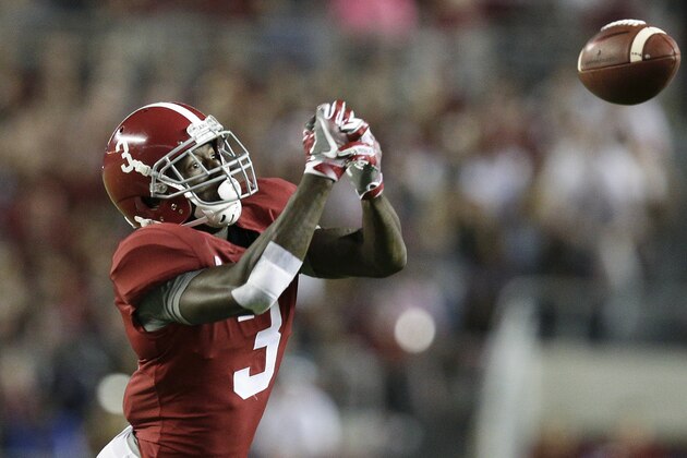Alabama wide receiver Calvin Ridley misses the ball during the first half of an NCAA college football game against Mississippi, Saturday, Sept. 30, 2017, in Tuscaloosa, Ala. Alabama won 66-3. (AP Photo/Brynn Anderson)