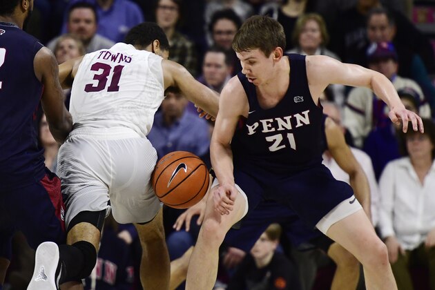 PHILADELPHIA, PA - FEBRUARY 24: Seth Towns #31 of the Harvard Crimson loses the ball against Ryan Betley #21 of the Pennsylvania Quakers during the second half at The Palestra on February 24, 2018 in Philadelphia, Pennsylvania. Penn defeated Harvard 74-71. (Photo by Corey Perrine/Getty Images)