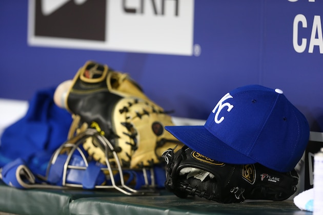 ARLINGTON, TX - MAY 11: A Kansas City Royals hat is seen in the dugout during a game against the Texas Rangers at Globe Life Park in Arlington on May 11, 2015 in Arlington, Texas.  (Photo by Sarah Glenn/Getty Images)
