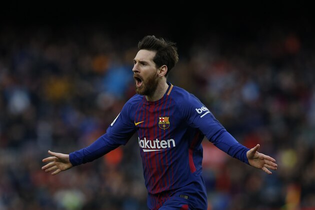 FC Barcelona's Lionel Messi reacts after scoring during the Spanish La Liga soccer match between FC Barcelona and Atletico Madrid at the Camp Nou stadium in Barcelona, Spain, Sunday, March 4, 2018. (AP Photo/Manu Fernandez)