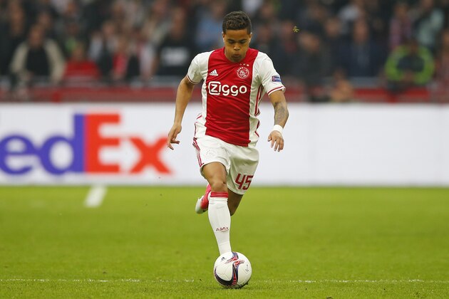 Ajax's Justin Kluivert plays the ball during the first leg semi final soccer match between Ajax and Olympique Lyon in the Amsterdam ArenA stadium, Netherlands, Wednesday, May 3, 2017. (AP Photo/Peter Dejong)