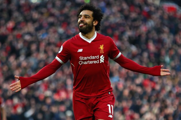 LIVERPOOL, ENGLAND - FEBRUARY 24:  Mohamed Salah of Liverpool celebrates scoring his side's second goal  during the Premier League match between Liverpool and West Ham United at Anfield on February 24, 2018 in Liverpool, England.  (Photo by Clive Brunskill/Getty Images)