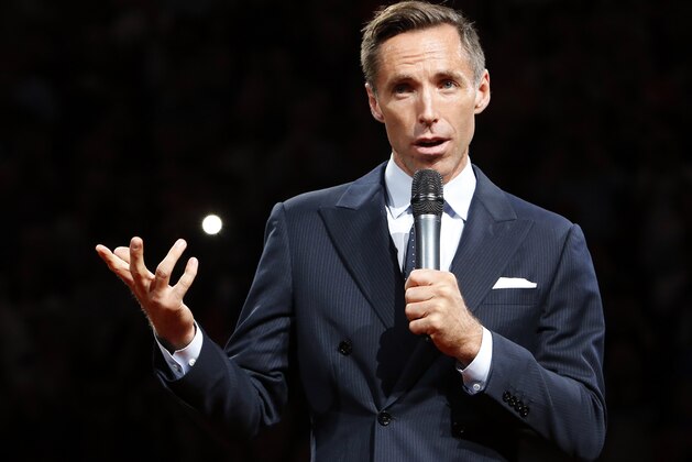 Two-time NBA most valuable player Steve Nash is introduced into the Suns Ring of Fire at halftime of an NBA basketball game between the Phoenix Suns and the Portland Trail Blazers, Friday, Oct. 30, 2015, in Phoenix. (AP Photo/Rick Scuteri)