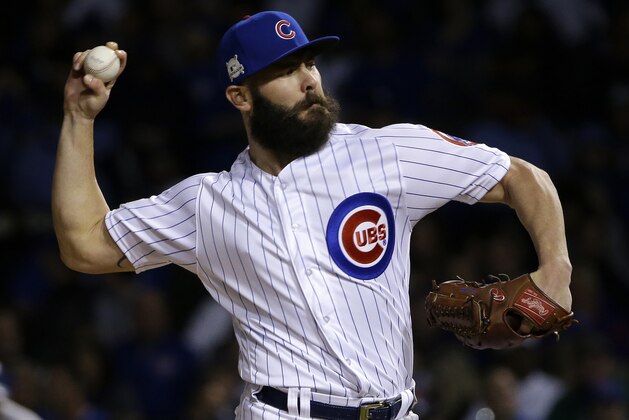 FILE - In this Wednesday, Oct. 18, 201,7 file photo, Chicago Cubs starting pitcher Jake Arrieta throws during the first inning of Game 4 of baseball's National League Championship Series against the Los Angeles Dodgers in Chicago. Cubs pitchers Arrieta and Wade Davis  were among nine free agents who turned down $17.4 million qualifying offers from their teams Thursday, Nov. 16, 2017. (AP Photo/Nam Y. Huh, File)