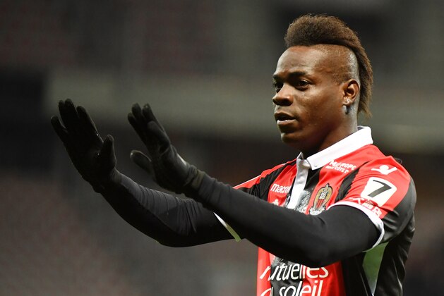 Nice's Italian forward Mario Balotelli celebrates after scoring a goal during the French L1 football match Nice (OGCN) vs Lille (LOSC) on March 2, 2018 at Allianz Riviera Stadium in Nice.  / AFP PHOTO / YANN COATSALIOU        (Photo credit should read YANN COATSALIOU/AFP/Getty Images)