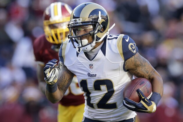 FILE - In this Dec. 7, 2014, file photo, St. Louis Rams wide receiver Stedman Bailey (12) carries the ball during an NFL football game against the Washington Redskins in Landover, Md. The Rams waived Bailey this week, but they intend to keep the receiver around the team while he recovers from gunshot wounds sustained last year. Bailey hasn’t been cleared medically to resume his football career. (AP Photo/Patrick Semansky, File)
