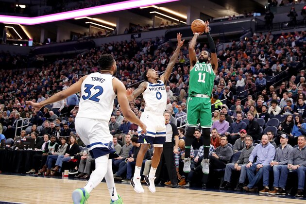 MINNEAPOLIS, MN -  MARCH 8: Kyrie Irving #11 of the Boston Celtics shoots the ball during the game against the Minnesota Timberwolves on March 8, 2018 at Target Center in Minneapolis, Minnesota. NOTE TO USER: User expressly acknowledges and agrees that, by downloading and or using this Photograph, user is consenting to the terms and conditions of the Getty Images License Agreement. Mandatory Copyright Notice: Copyright 2018 NBAE (Photo by Jordan Johnson/NBAE via Getty Images)