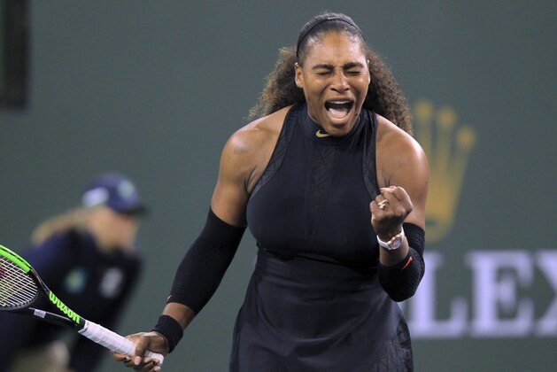 Serena Williams clenches her fist while playing Zarina Diyas during the first round of the BNP Paribas Open tennis tournament in Indian Wells, Calif., Thursday, March 8, 2018. (AP Photo/Crystal Chatham)