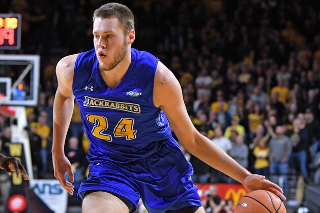 WICHITA, KS - DECEMBER 05:  Mike Daum #24 of the South Dakota State Jackrabbits dribbles the ball up court against the Wichita State Shockers during the second half on December 05, 2017 at Charles Koch Arena in Wichita, Kansas.  (Photo by Peter G. Aiken/Getty Images)