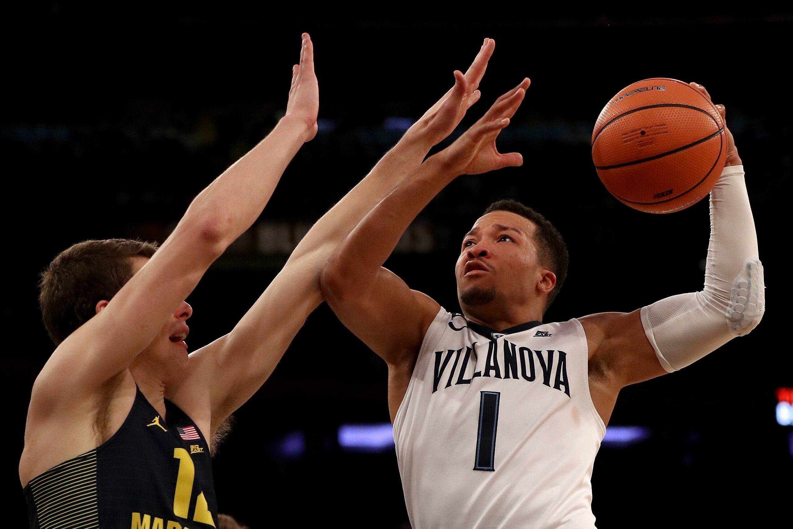 NEW YORK, NY - MARCH 08: Jalen Brunson #1 of the Villanova Wildcats takes a shot as Matt Heldt #12 of the Marquette Golden Eagles defends during quarterfinals of the Big East Basketball Tournament at Madison Square Garden on March 8, 2018 in New York City. (Photo by Elsa/Getty Images) NEW YORK, NY - MARCH 08: Jalen Brunson #1 of the Villanova Wildcats takes a shot as Matt Heldt #12 of the Marquette Golden Eagles defends during quarterfinals of the Big East Basketball Tournament at Madison Square Garden on March 8, 2018 in New York City. (Photo by Elsa/Getty Images)