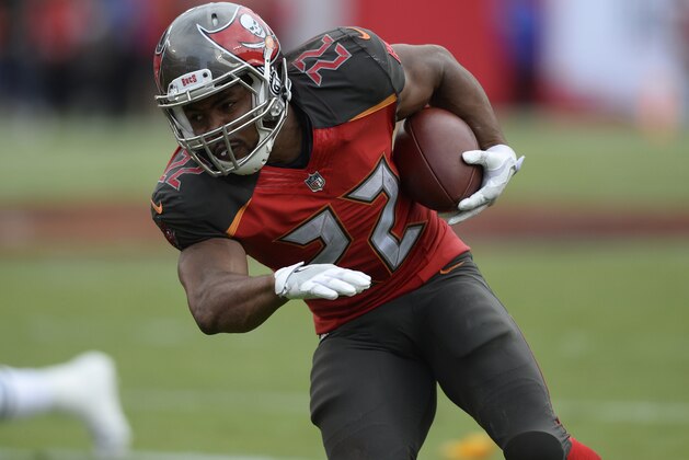FILE - In this Nov. 12, 2017, file photo, Tampa Bay Buccaneers running back Doug Martin (22) runs during the second half of an NFL football game against the New York Jets, in Tampa, Fla. Two-time Pro Bowl running back Doug Martin has been released by the Tampa Bay Buccaneers, Tuesday, Feb. 20, 2018, who may look for a replacement in free agency.(AP Photo/Jason Behnken, File)
