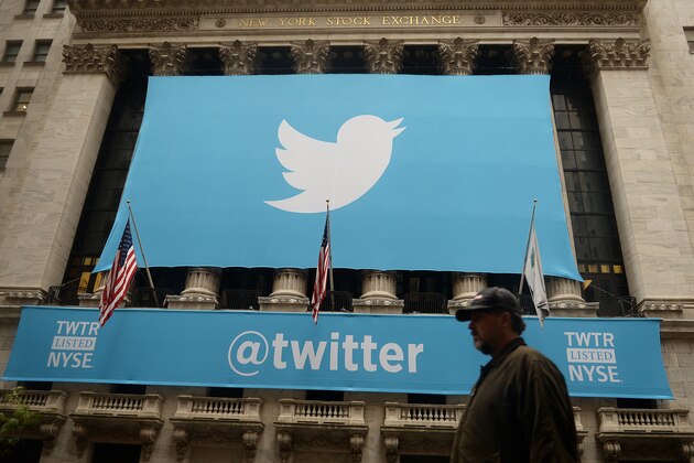 A banner with the logo of Twitter is set on the front of the New York Stock Exchange (NYSE) on November 7, 2013 in New York.  Twitter hit Wall Street with a bang on Thursday, as an investor frenzy quickly sent shares surging after the public share offering for the fast-growing social network. In the first exchanges, Twitter vaulted 80.7 percent to $47, a day after the initial public offering (IPO) at $26 per share. While some analysts cautioned about the fast-changing nature of social media, the debut led to a stampede for Twitter shares. AFP PHOTO/EMMANUEL DUNAND        (Photo credit should read EMMANUEL DUNAND/AFP/Getty Images)