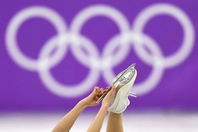 Close up of Japan's Kaori Sakamoto's skates as she compete in the women's single skating free skating of the figure skating event during the Pyeongchang 2018 Winter Olympic Games at the Gangneung Ice Arena in Gangneung on February 23, 2018. / AFP PHOTO / Kirill KUDRYAVTSEV        (Photo credit should read KIRILL KUDRYAVTSEV/AFP/Getty Images)