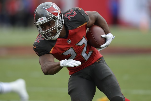 FILE - In this Nov. 12, 2017, file photo, Tampa Bay Buccaneers running back Doug Martin (22) runs during the second half of an NFL football game against the New York Jets, in Tampa, Fla. Two-time Pro Bowl running back Doug Martin has been released by the Tampa Bay Buccaneers, Tuesday, Feb. 20, 2018, who may look for a replacement in free agency.(AP Photo/Jason Behnken, File)