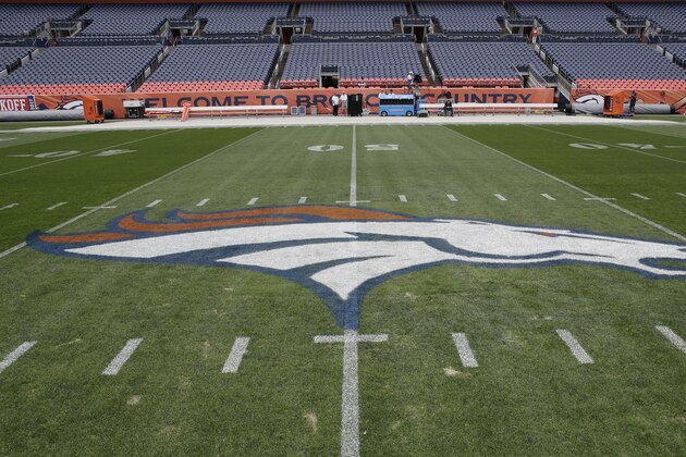 The Denver Broncos logo is painted on the field at Mile High Stadium prior to an NFL football game against the Los Angeles Chargers, Monday, Sept. 11, 2017, in Denver. (AP Photo/Jack Dempsey)