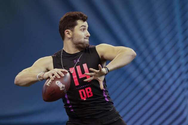 Oklahoma quarterback Baker Mayfield runs a drill at the NFL football scouting combine in Indianapolis, Saturday, March 3, 2018. (AP Photo/Michael Conroy)
