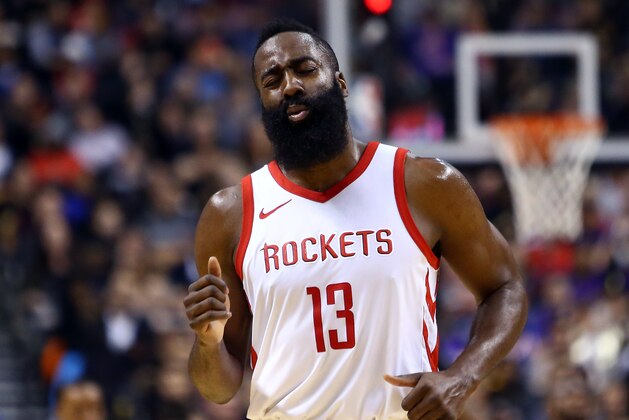 TORONTO, ON - MARCH 9:  James Harden #13 of the Houston Rockets reacts after being fouled during the first half of an NBA game against the Toronto Raptors at Air Canada Centre on March 9, 2018 in Toronto, Canada.  NOTE TO USER: User expressly acknowledges and agrees that, by downloading and or using this photograph, User is consenting to the terms and conditions of the Getty Images License Agreement.  (Photo by Vaughn Ridley/Getty Images)