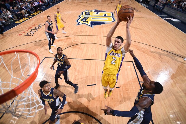 DENVER, CO - MARCH 9: Lonzo Ball #2 of the Los Angeles Lakers shoots the ball against the Denver Nuggets  on March 9, 2018 at the Pepsi Center in Denver, Colorado. NOTE TO USER: User expressly acknowledges and agrees that, by downloading and/or using this Photograph, user is consenting to the terms and conditions of the Getty Images License Agreement. Mandatory Copyright Notice: Copyright 2018 NBAE (Photo by Garrett Ellwood/NBAE via Getty Images)