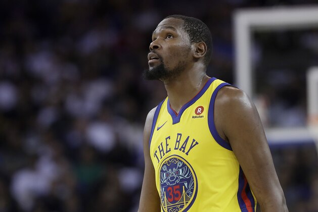 Golden State Warriors forward Kevin Durant (35) during the second half of an NBA basketball game against the San Antonio Spurs in Oakland, Calif., Thursday, March 8, 2018. (AP Photo/Jeff Chiu)