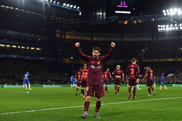 Barcelona's Argentinian striker Lionel Messi celebrates after scoring their first goal during the first leg of the UEFA Champions League round of 16 football match between Chelsea and Barcelona at Stamford Bridge stadium in London on February 20, 2018. / AFP PHOTO / Ben STANSALL        (Photo credit should read BEN STANSALL/AFP/Getty Images)