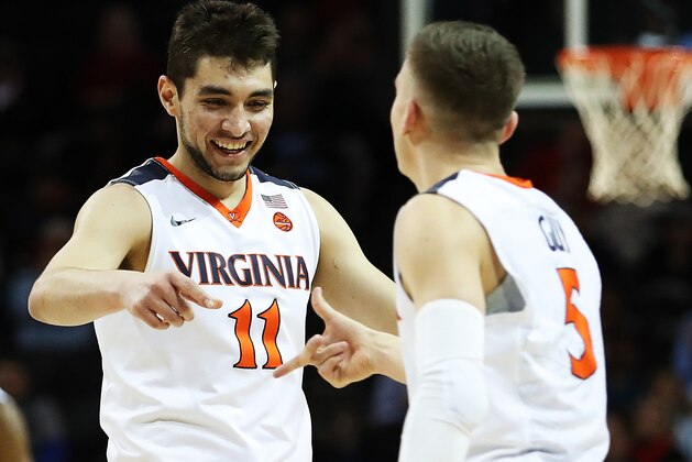 NEW YORK, NY - MARCH 09:  Ty Jerome #11 of the Virginia Cavaliers and Kyle Guy #5 celebrate a basket against the Clemson Tigers during the semifinals of the ACC Men's Basketball Tournament at the  Barclays Center on March 9, 2018 in New York City.  (Photo by Al Bello/Getty Images)