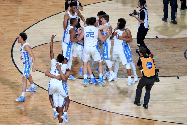 GLENDALE, AZ - APRIL 03:  The North Carolina Tar Heels celebrate after defeating the Gonzaga Bulldogs during the 2017 NCAA Men's Final Four National Championship game at University of Phoenix Stadium on April 3, 2017 in Glendale, Arizona. The Tar Heels defeated the Bulldogs 71-65.  (Photo by Christian Petersen/Getty Images)