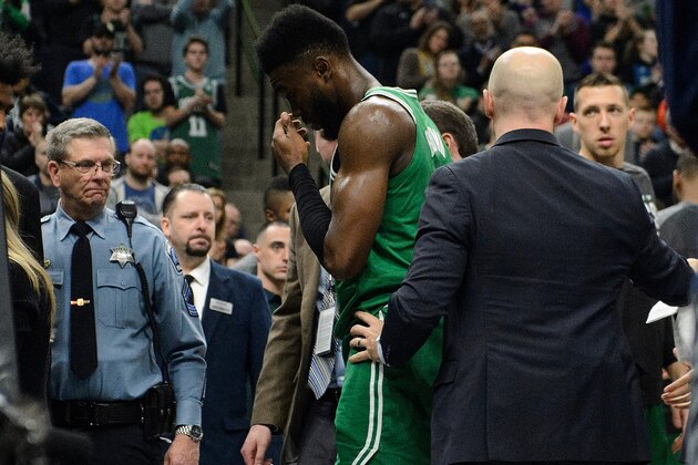 MINNEAPOLIS, MN - MARCH 08: Jaylen Brown #7 of the Boston Celtics walks off the court after a hard fall during the fourth quarter of the game against the Minnesota Timberwolves on March 8, 2018 at the Target Center in Minneapolis, Minnesota. NOTE TO USER: User expressly acknowledges and agrees that, by downloading and or using this Photograph, user is consenting to the terms and conditions of the Getty Images License Agreement. (Photo by Hannah Foslien/Getty Images)